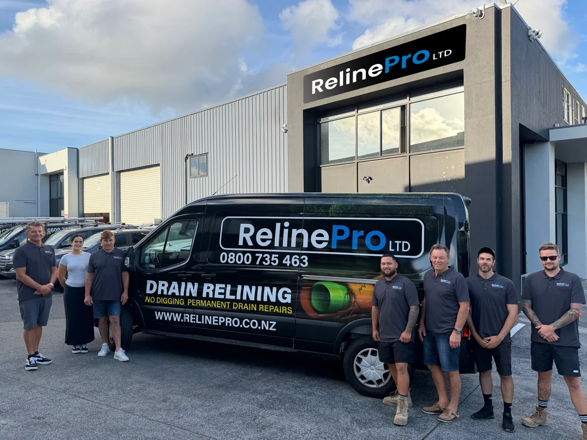 The RelinePro crew with relining equipment on an Auckland job site